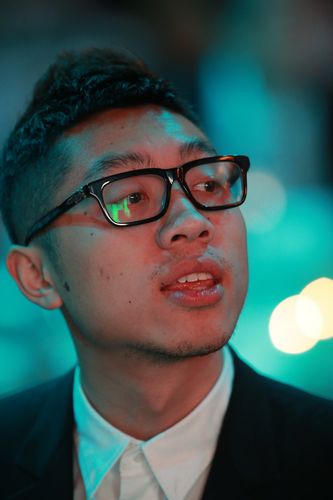 Xu Xin mit schicker Brille (©ITTF)